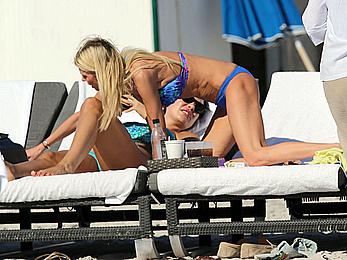 Tara Reid cleavage and cameltoe in bikini in Miami