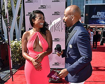 Tatyana Ali shows nice cleavage at the 2014 BET Awards in LA