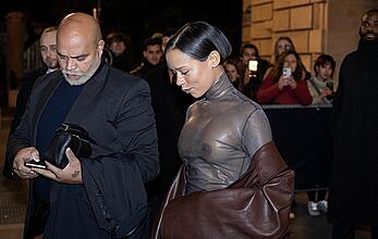 Taylor Russell braless in a see through top leaving her hotel in Paris