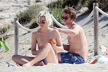 Teliz Alley girlfriend of Alfie Allen topless on a beach in Formentera