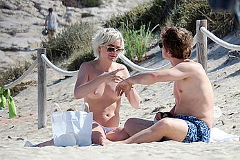 Teliz Alley girlfriend of Alfie Allen topless on a beach in Formentera