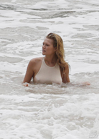 Toni Garrn nude tits under transparent wet top