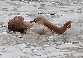 Toni Garrn nude tits under transparent wet top