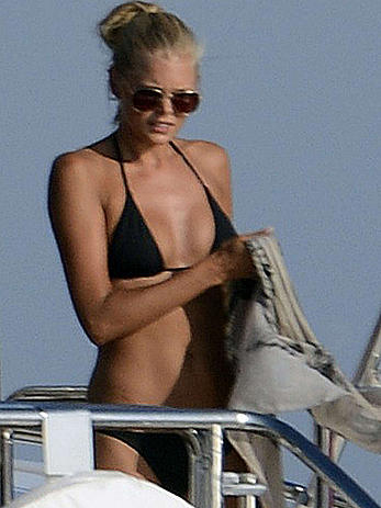 Toni Garrn in bikini and topless on a yacht in Ibiza