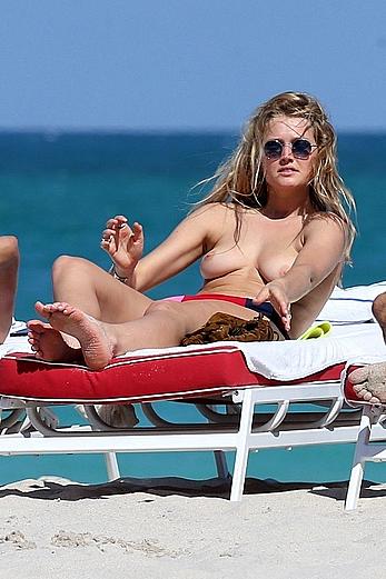 Toni Garrn topless on a beach in Miami