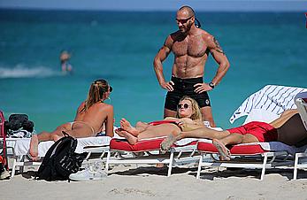 Toni Garrn topless on a beach in Miami