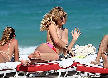 Toni Garrn topless on a beach in Miami