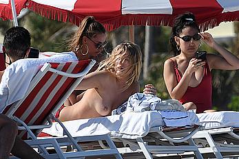 Toni Garrn topless on a beach in Miami