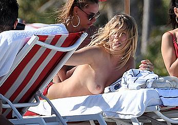 Toni Garrn topless on a beach in Miami