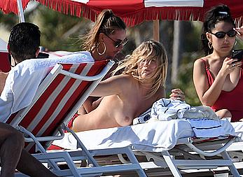 Toni Garrn topless on a beach in Miami