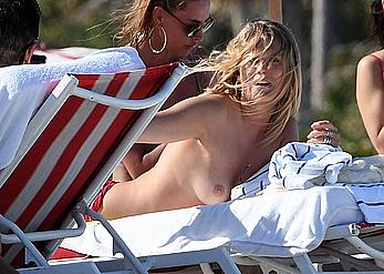 Toni Garrn topless on a beach in Miami