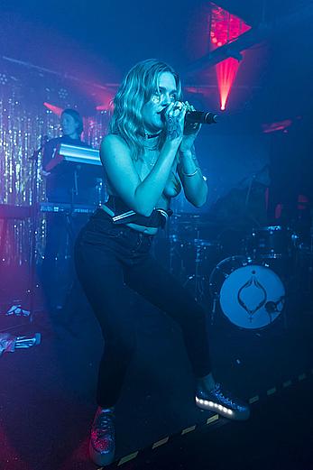 Tove Lo performing topless during a special album launch In East London