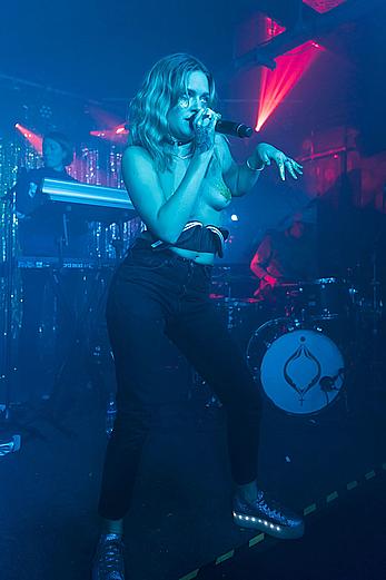 Tove Lo performing topless during a special album launch In East London