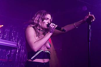 Tove Lo performing topless during a special album launch In East London