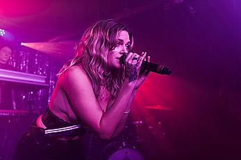 Tove Lo performing topless during a special album launch In East London