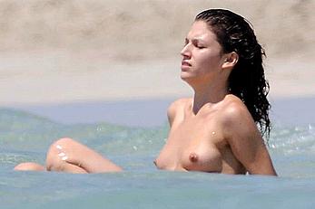 Spanish actress Ursula Corbero topless on a beach