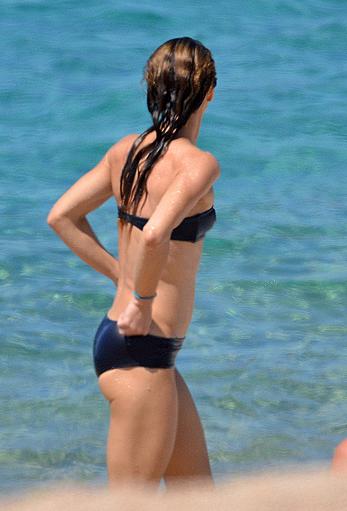 Vanessa Paradis sunbathing topless on the beach in Corsica