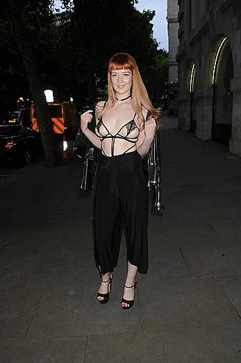 Victoria Clay almost topless in see through bra at the party in London