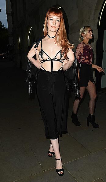 Victoria Clay almost topless in see through bra at the party in London