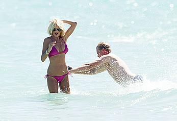 Victoria Silvstedt in pink bikini enjoys and relaxes in the sun at Miami Beach