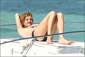 Natalia Vodianova sunbathing topless on a yacht in St Barth