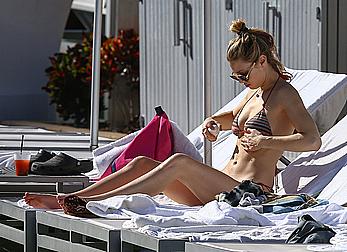 Whitney Port cleavage in bikini candids