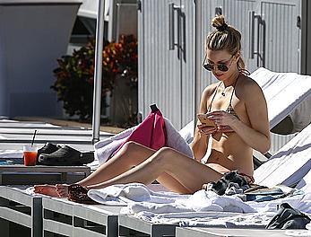 Whitney Port cleavage in bikini candids