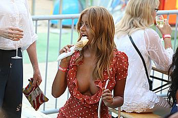 Zahia Dehar upskirt and boob slip at the Opening of The Tuileries Fun Fair in Paris