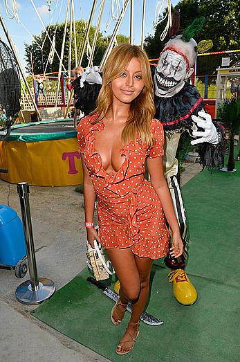 Zahia Dehar upskirt and boob slip at the Opening of The Tuileries Fun Fair in Paris