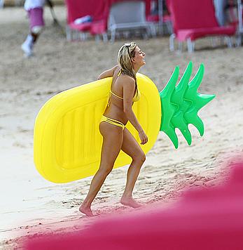 Zara Holland sexy in yellow bikini in Barbados