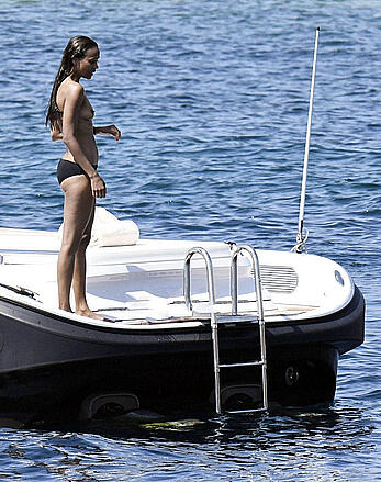 Zoe Saldana topless on a yacht in Italy