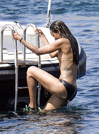 Zoe Saldana topless on a yacht in Italy