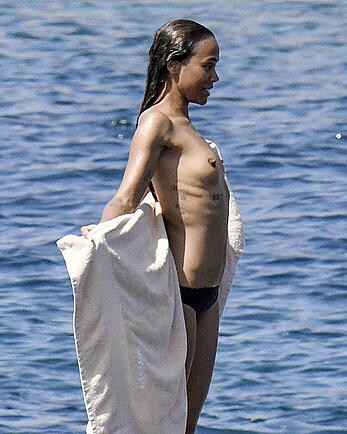 Zoe Saldana topless on a yacht in Italy