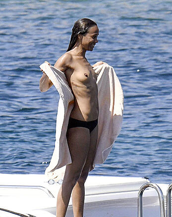 Zoe Saldana topless on a yacht in Italy