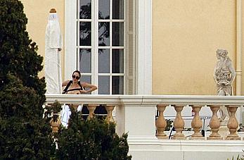 Angelina Jolie caught topless on the hotel balcony