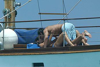 Manuela Arcuri sunbathing topless on a yacht