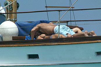 Manuela Arcuri sunbathing topless on a yacht