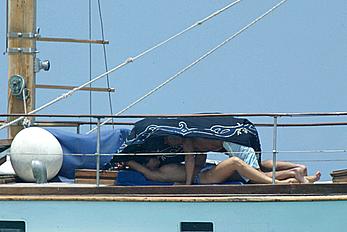 Manuela Arcuri sunbathing topless on a yacht