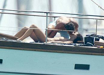 Manuela Arcuri sunbathing topless on a yacht