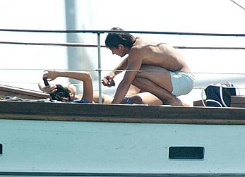 Manuela Arcuri sunbathing topless on a yacht