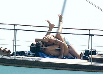 Manuela Arcuri sunbathing topless on a yacht