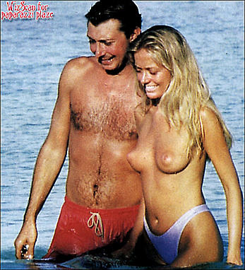 Italian actress Brigitta Boccoli topless in a water with honey