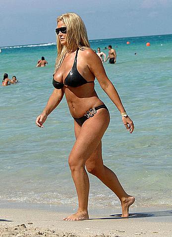 Kim Zolciak deep cleavage in black bikini