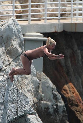 Lily Allen topless in Eden Rock