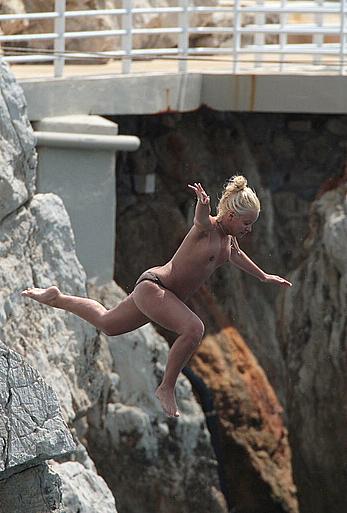 Lily Allen topless in Eden Rock