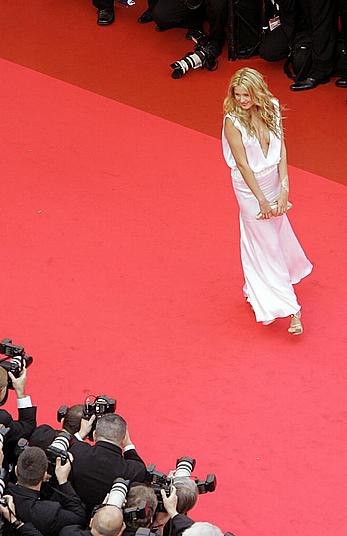 Petra Nemcova shows side of boob at Cannes red carpet